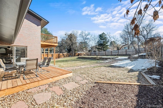 view of yard with a wooden deck