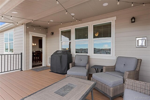 wooden terrace with grilling area