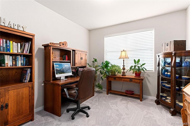 home office featuring light colored carpet