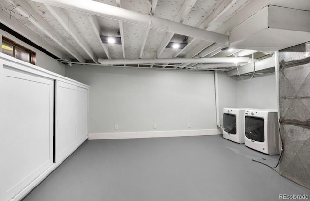 laundry room featuring washer and clothes dryer