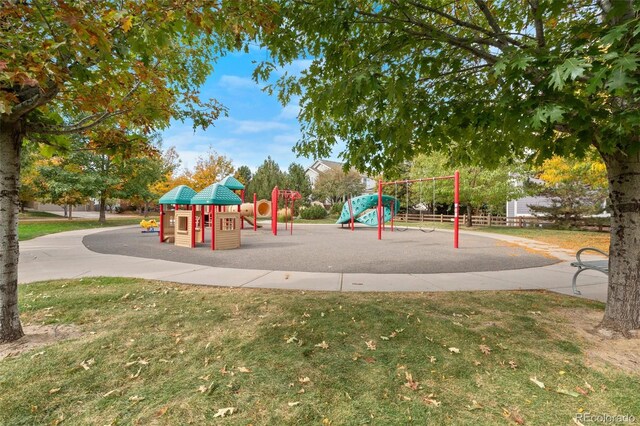 view of playground with a yard