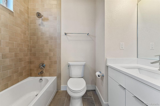 full bath featuring shower / bathing tub combination, toilet, wood tiled floor, vanity, and baseboards