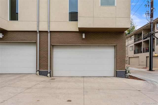 garage featuring driveway