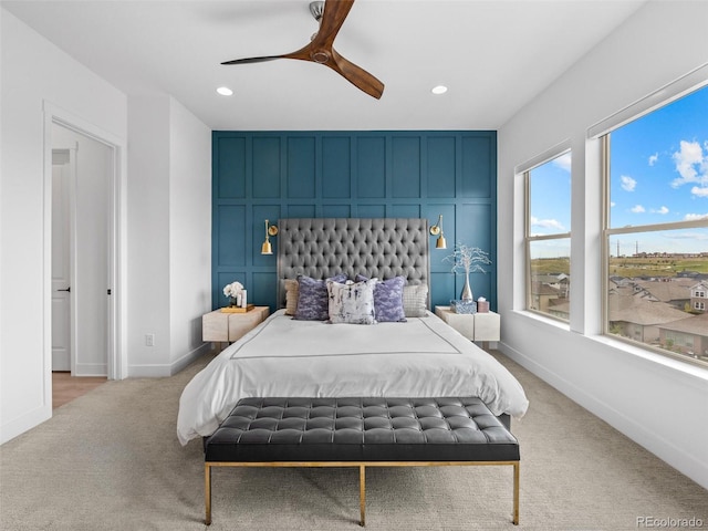 bedroom featuring carpet, baseboards, ceiling fan, and recessed lighting