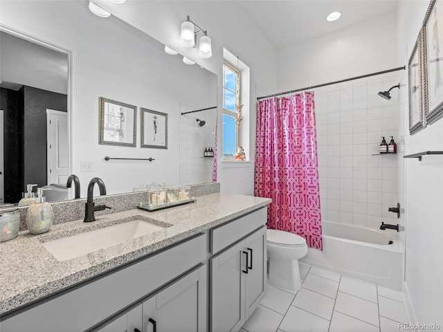 full bath with shower / tub combo with curtain, vanity, toilet, and tile patterned floors