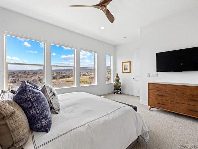 bedroom with recessed lighting, light carpet, ceiling fan, and baseboards