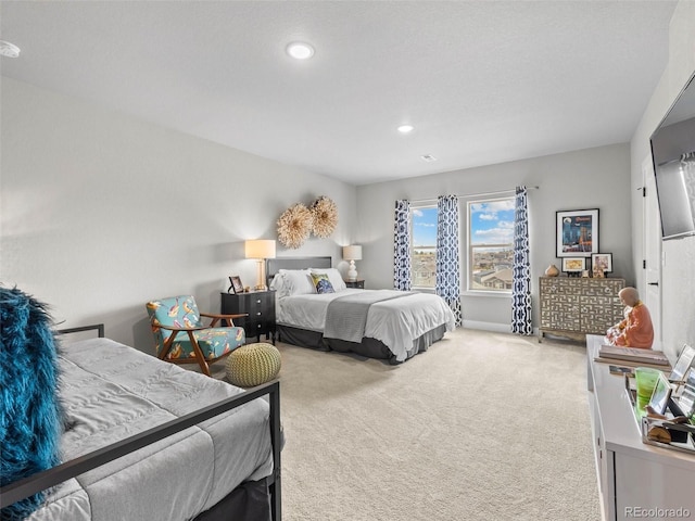 carpeted bedroom featuring recessed lighting