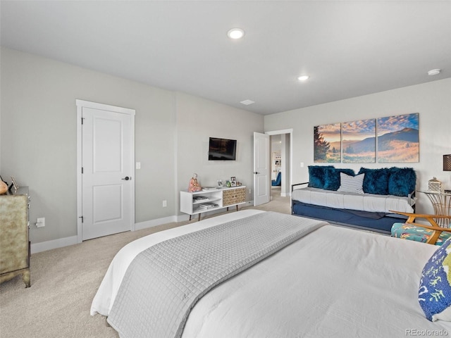 bedroom with light carpet, baseboards, and recessed lighting