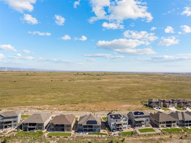 aerial view with a rural view and a residential view