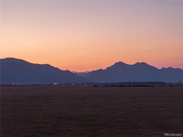 property view of mountains with a rural view