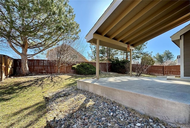 view of yard featuring a fenced backyard and a patio area