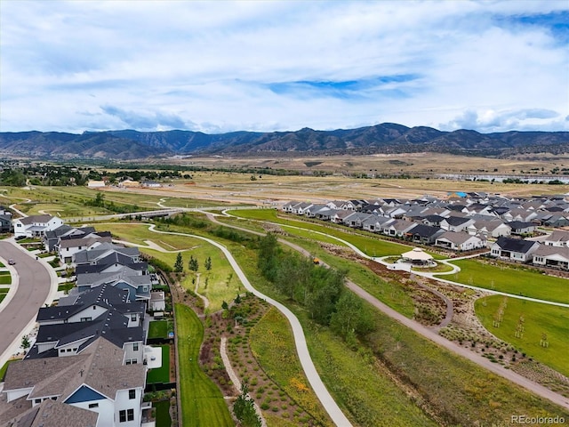 drone / aerial view featuring a mountain view