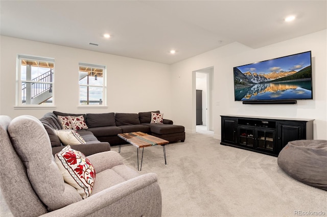 living room featuring light colored carpet