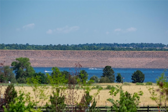 property view of water with a rural view