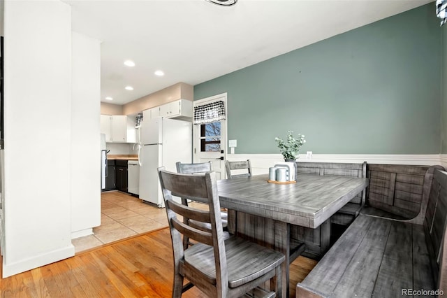 dining area with light hardwood / wood-style flooring