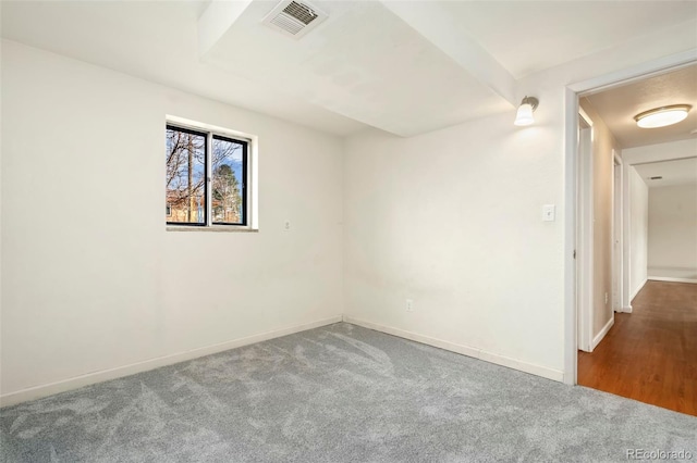 spare room with carpet flooring