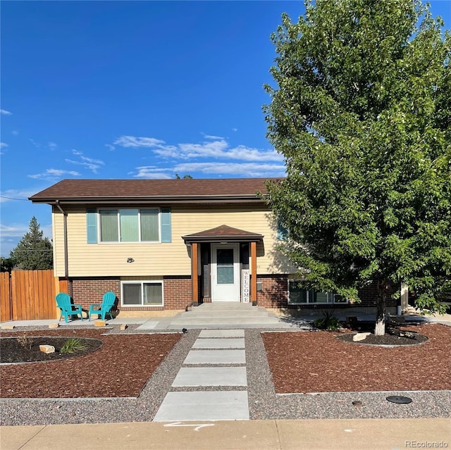 raised ranch with a patio area