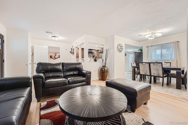 living room with light wood-type flooring