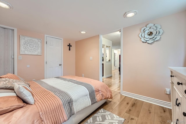 bedroom featuring light hardwood / wood-style flooring