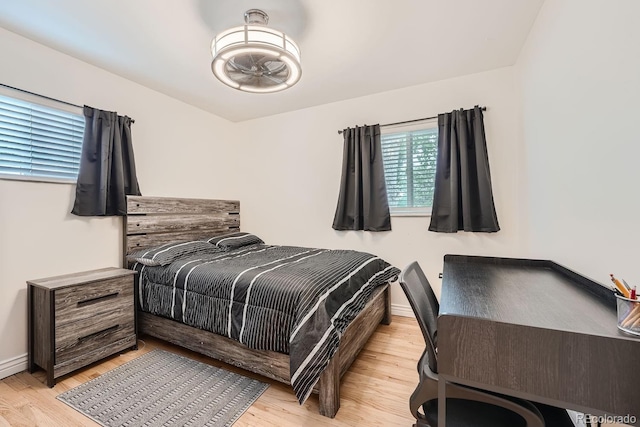 bedroom with light hardwood / wood-style floors