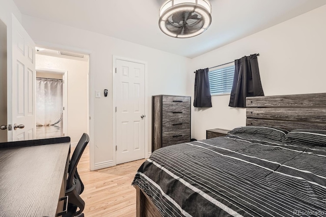 bedroom featuring light wood-type flooring