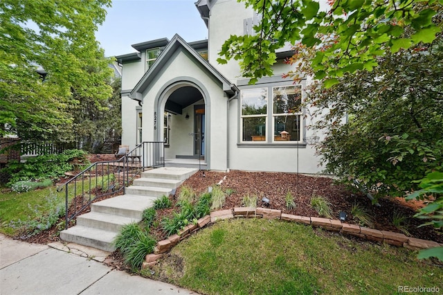 8276 E 28th Dr, Denver, CO 80238 - tudor home featuring stucco siding