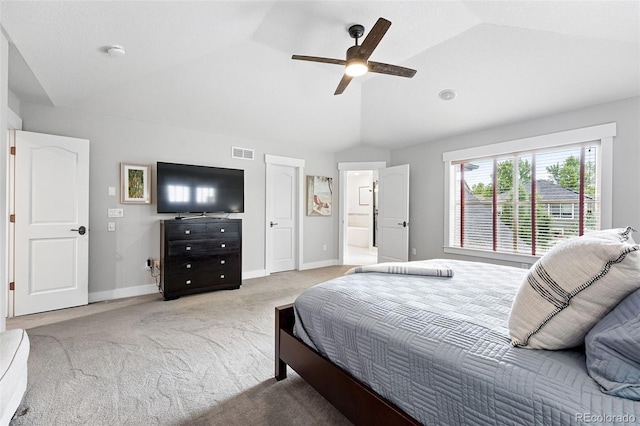 8276 E 28th Dr, Denver, CO 80238 - bedroom with lofted ceiling, light colored carpet, baseboards, and a ceiling fan