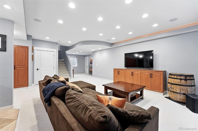 8276 E 28th Dr, Denver, CO 80238 - living area with stairs, light colored carpet, recessed lighting, and baseboards