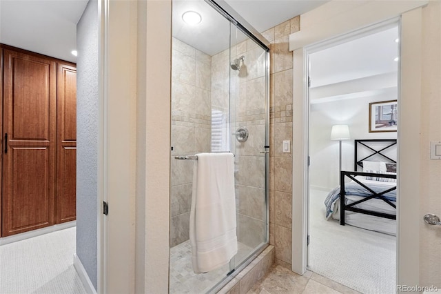 8276 E 28th Dr, Denver, CO 80238 - full bathroom with a stall shower and tile patterned flooring