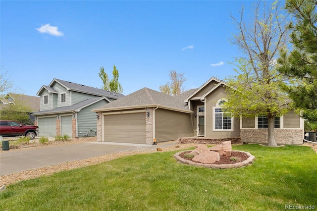 view of front of home with asphalt driveway, a garage, a front lawn, and brick siding