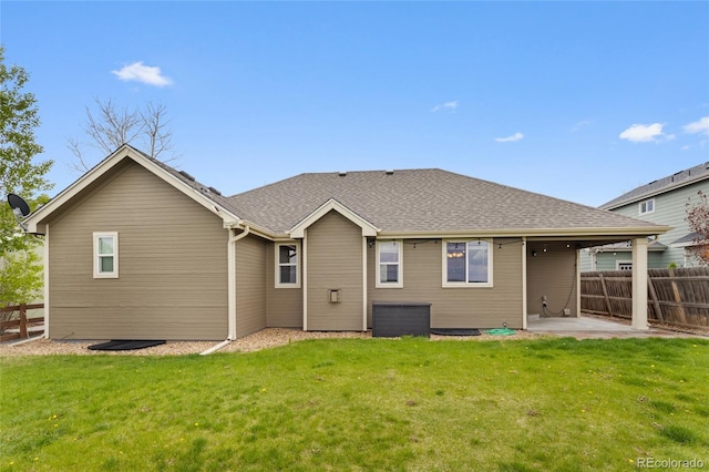 rear view of property featuring a patio area and central air condition unit