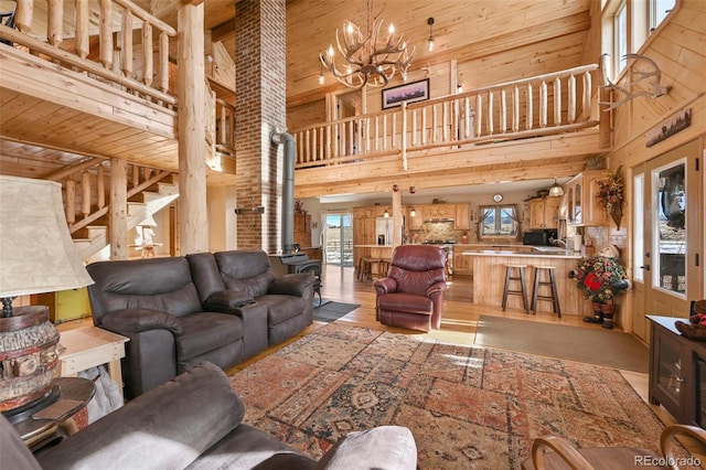 living room featuring wooden walls and a high ceiling