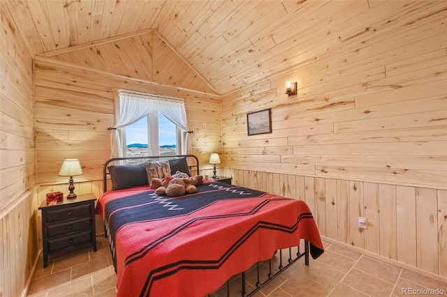 bedroom featuring wooden walls, wood ceiling, and lofted ceiling