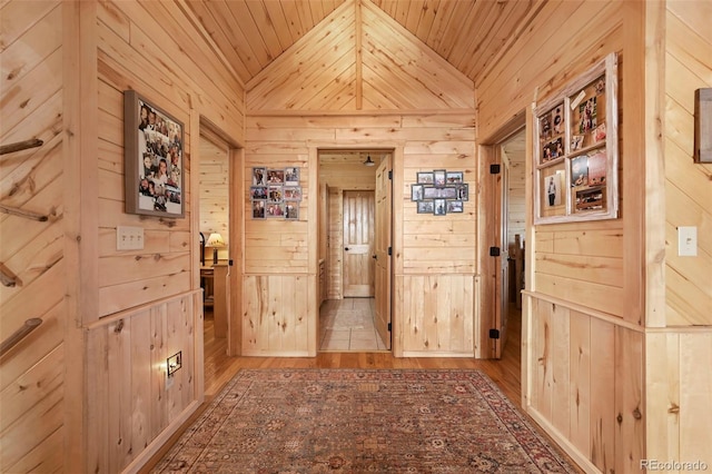 29 Howe Rd, Westcliffe, CO 81252 - hallway with wooden walls, wood ceiling, wood finished floors, and lofted ceiling