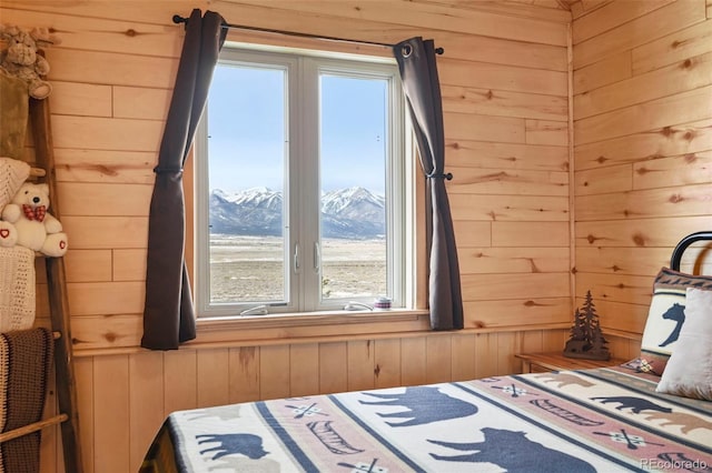29 Howe Rd, Westcliffe, CO 81252 - bedroom featuring wooden walls, multiple windows, and a mountain view
