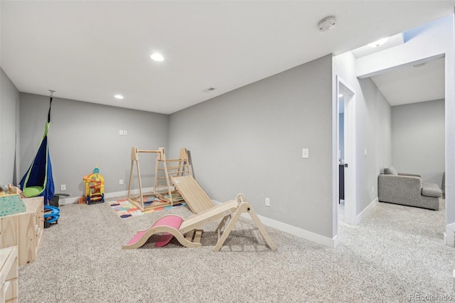 recreation room with carpet floors