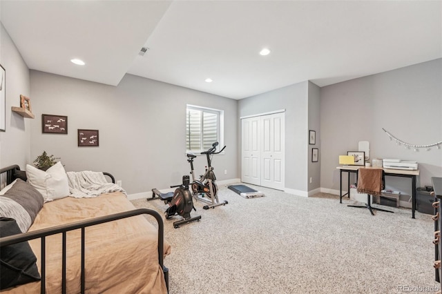 workout room featuring carpet floors