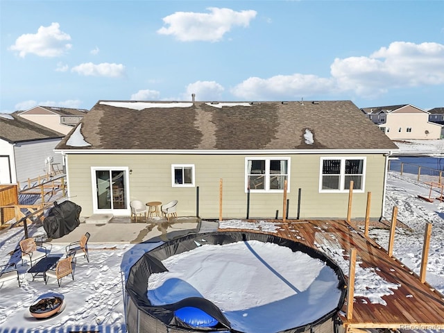 view of snow covered property