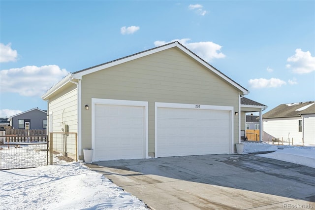 view of snow covered garage