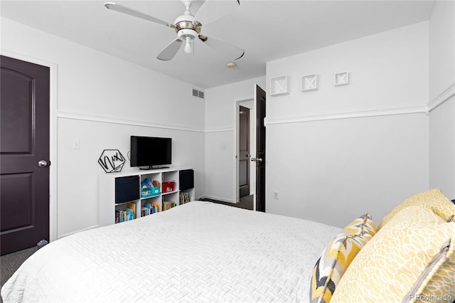 carpeted bedroom featuring a ceiling fan