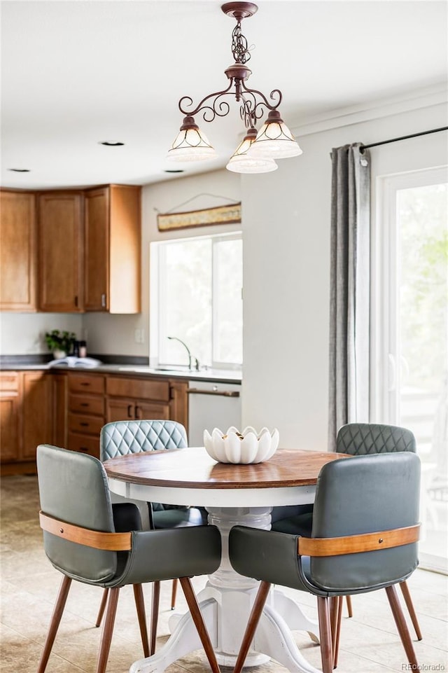 6385 S Nelson Way, Littleton, CO 80127 - dining area featuring crown molding