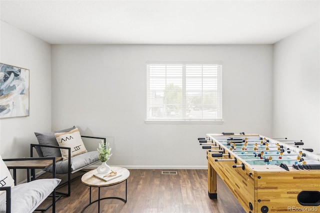 6385 S Nelson Way, Littleton, CO 80127 - game room featuring baseboards and dark wood-style floors