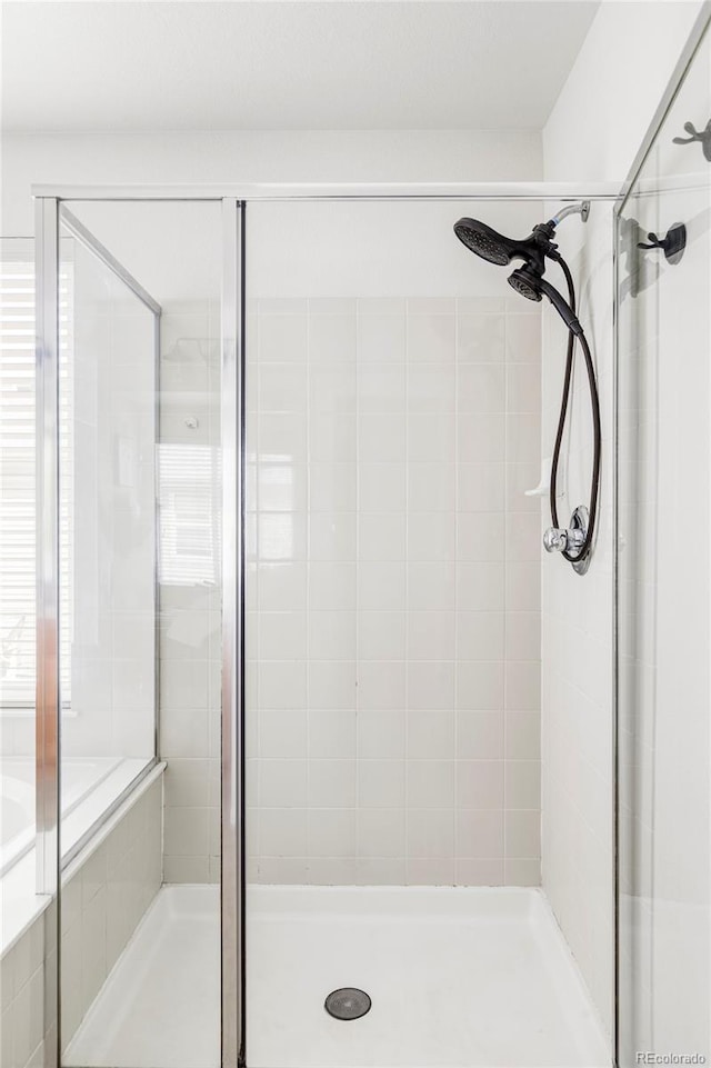 6385 S Nelson Way, Littleton, CO 80127 - bathroom with a shower stall