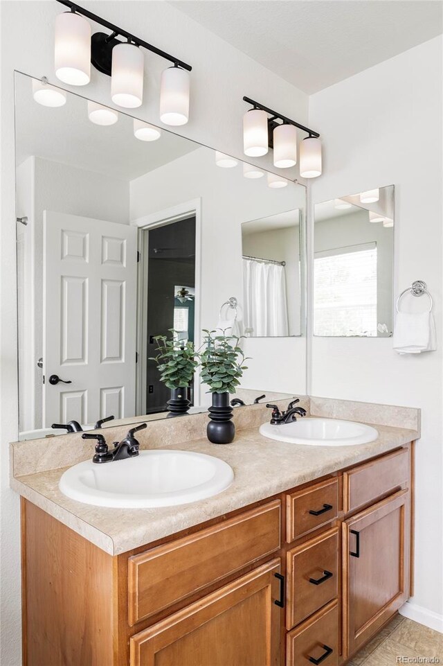 6385 S Nelson Way, Littleton, CO 80127 - bathroom featuring double vanity