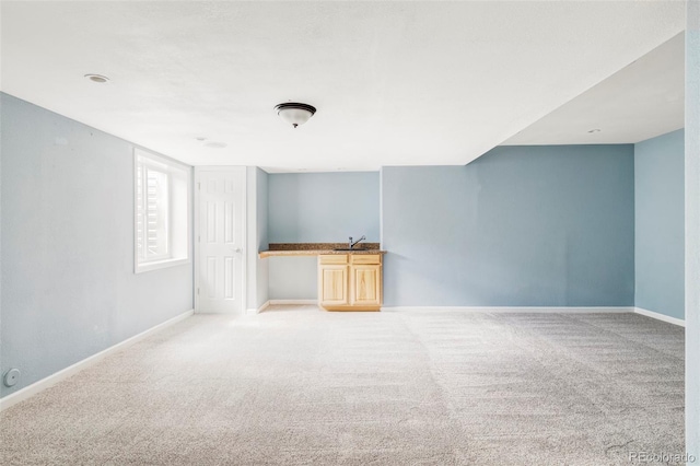 6385 S Nelson Way, Littleton, CO 80127 - empty room featuring light carpet and baseboards