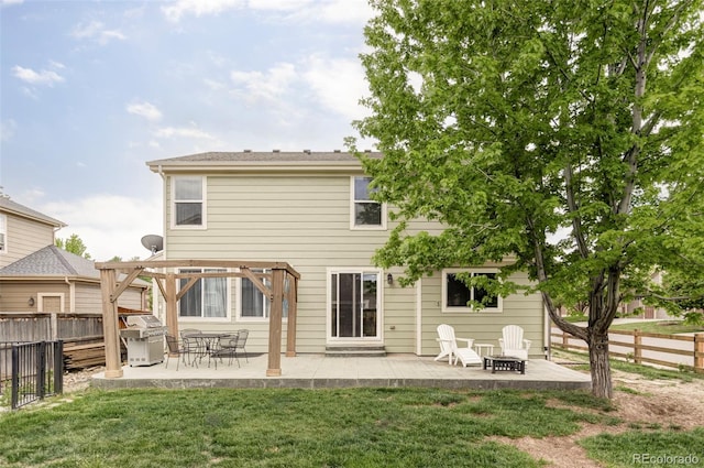 6385 S Nelson Way, Littleton, CO 80127 - rear view of property featuring a fenced backyard, a patio area, and a pergola