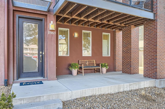 3795 Depew St Unit D, Wheat Ridge, CO 80212 - property entrance featuring brick siding