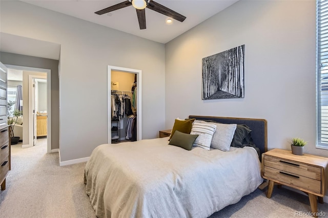 3795 Depew St Unit D, Wheat Ridge, CO 80212 - bedroom with light colored carpet, a walk in closet, a closet, ceiling fan, and recessed lighting