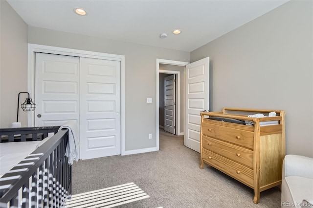 3795 Depew St Unit D, Wheat Ridge, CO 80212 - bedroom featuring a closet, light colored carpet, and recessed lighting