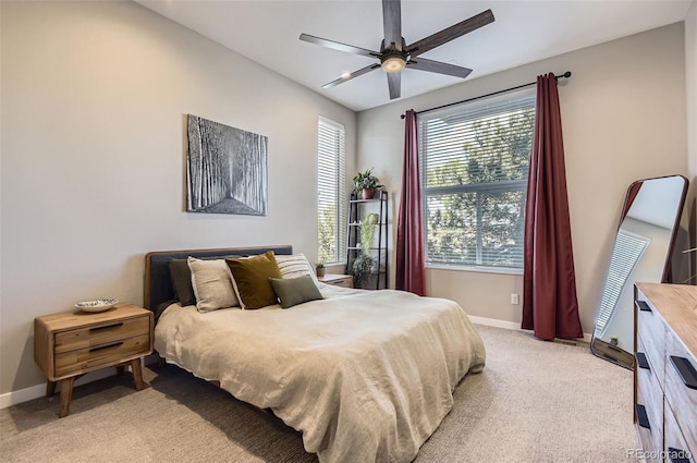 3795 Depew St Unit D, Wheat Ridge, CO 80212 - bedroom featuring light carpet and a ceiling fan